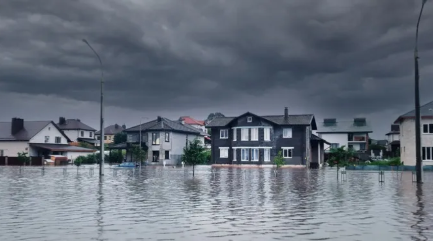 Houses in neighborhood flooded after storm.