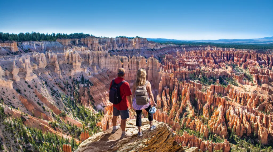 Couple looking at beautiful mountain view.